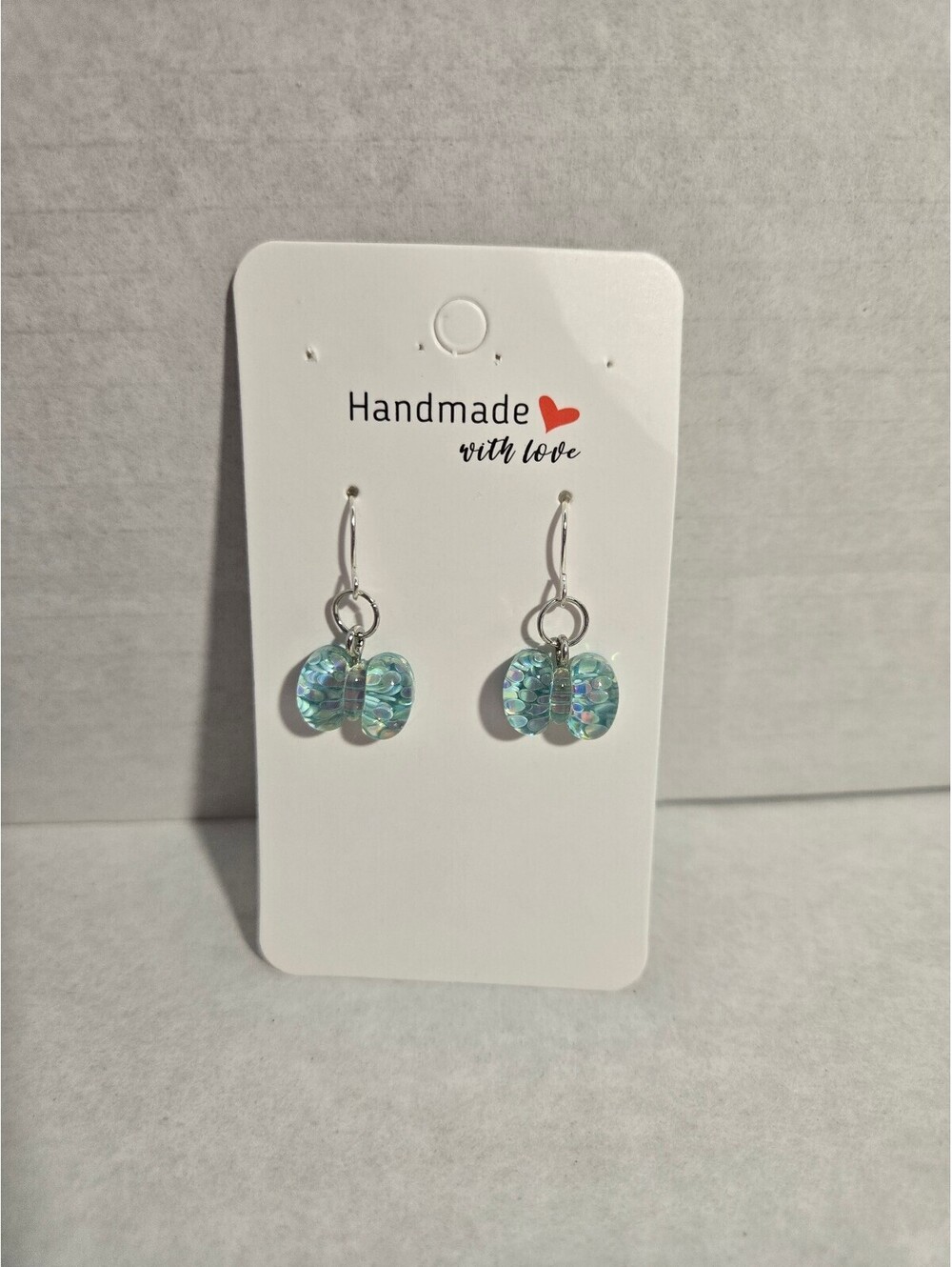 Earrings / Handcrafted Light Blue Iridescent Glitter Butterfly Dangle Earrings